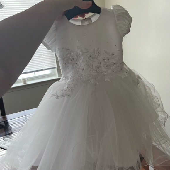 Beautiful 12 month old dress. She wore it for a wedding once and has it worn it - Picture 2 of 3